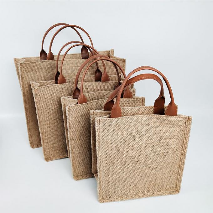 La aduana del fabricante de China imprimió la fuente de alimentación de lino del yute del bolso de compras del totalizador del algodón de los bolsos con gran precio